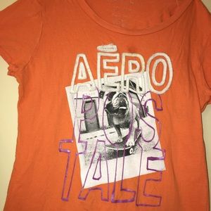 Cute Aeropostale orange top with a puppy bulldog!